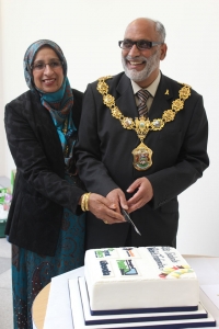 The Mayor of Pendle cutting the cake at the opening of Every Street